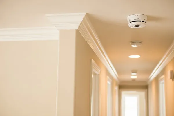 Fire and smoke detector installation in Naperville residential home with professional monitoring